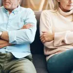 Married couple experiencing emotional distance while facing questions about marriage, divorce, and healthy boundaries.