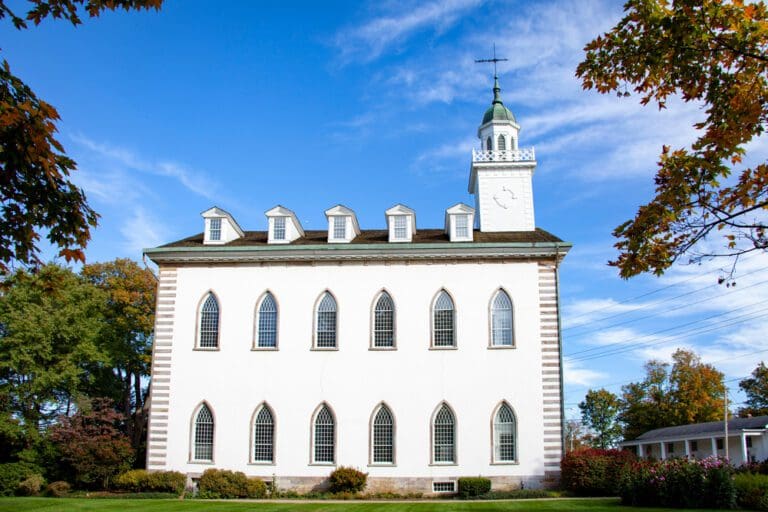 Kirtland Temple, the first Latter-day Saint temple, a sacred site of divine manifestations and early Church history.