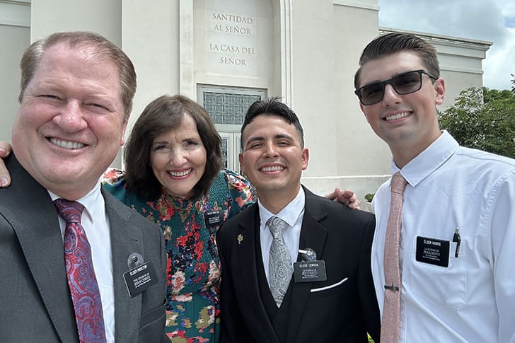 Proctors and LDS missionaries pose happily in front of the Puerto Rico temple, reflecting the joy and spiritual strength gained through their mission experiences.