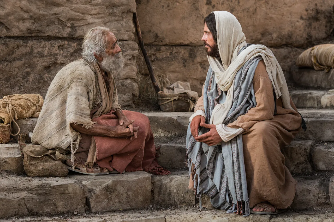 Jesus Christ talking with an elderly man, symbolizing compassion and spiritual renewal.