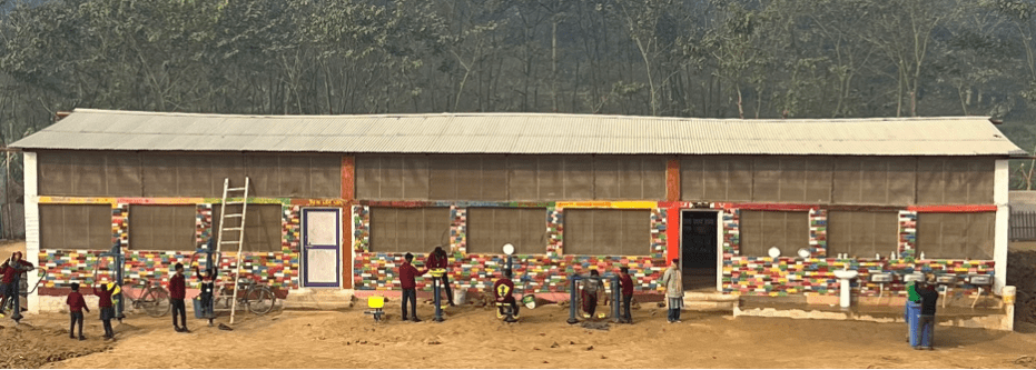 A temporary kitchen at the Bihar campus, painted vibrantly by students, awaits its transformation into the new campus office space.