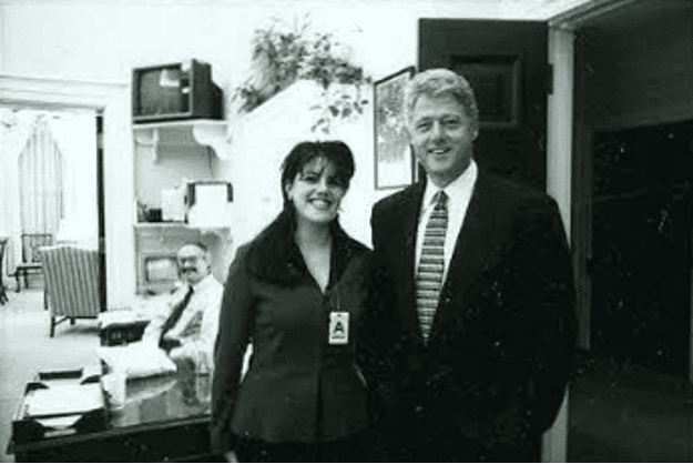 A historic black-and-white photograph of President Bill Clinton and Monica Lewinsky, capturing a moment tied to one of America’s most infamous political scandals.