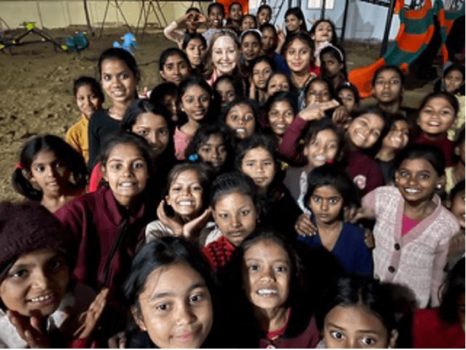 A joyful group of girls at the Rising Star Outreach campus in Bihar, India, excited to receive an education and a brighter future.