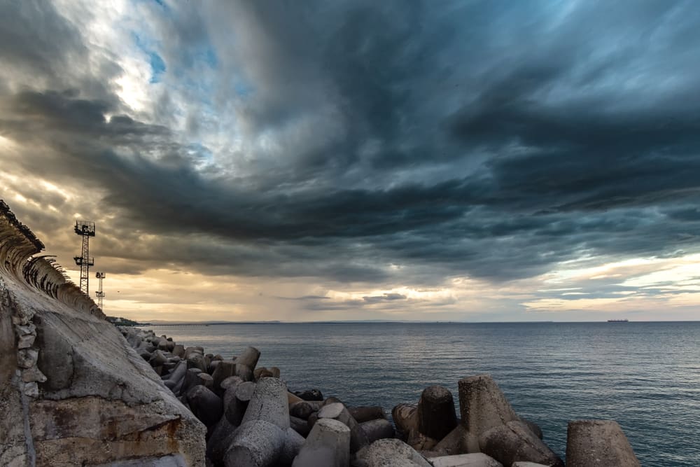 Storm over the ocean, representing the CES Letter controversy and its historical impact.