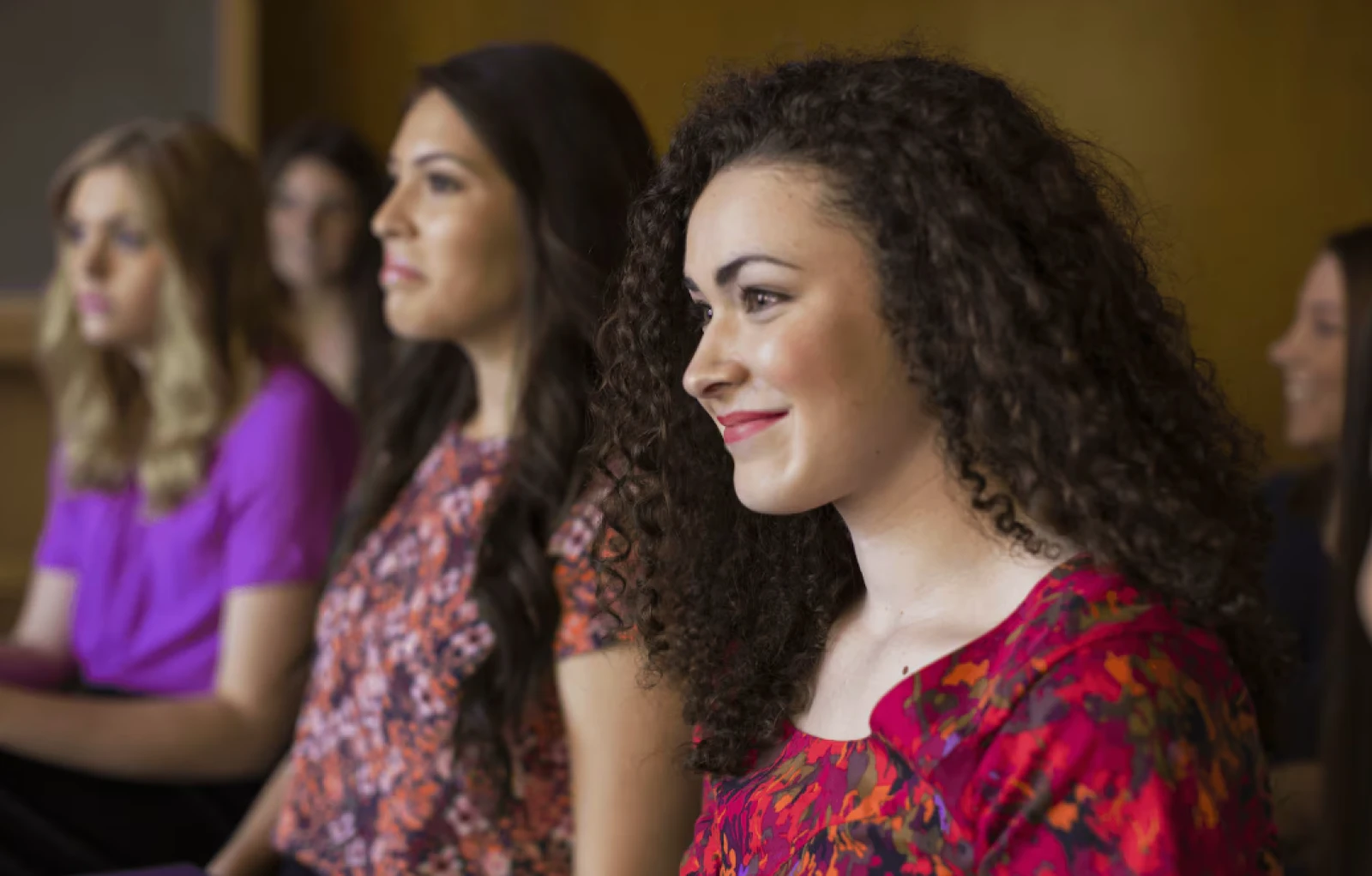 Young Latter-day Saint sister missionaries learning line upon line through missionary life and language training