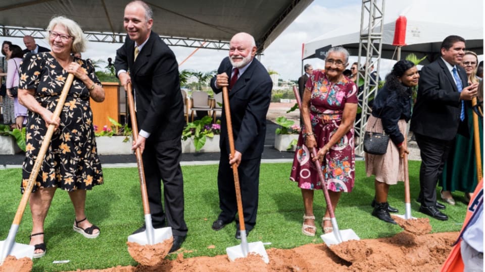 Latter-day Saint leaders and members break ground at the Natal Brazil Temple site during the official ceremony on May 17, 2025.