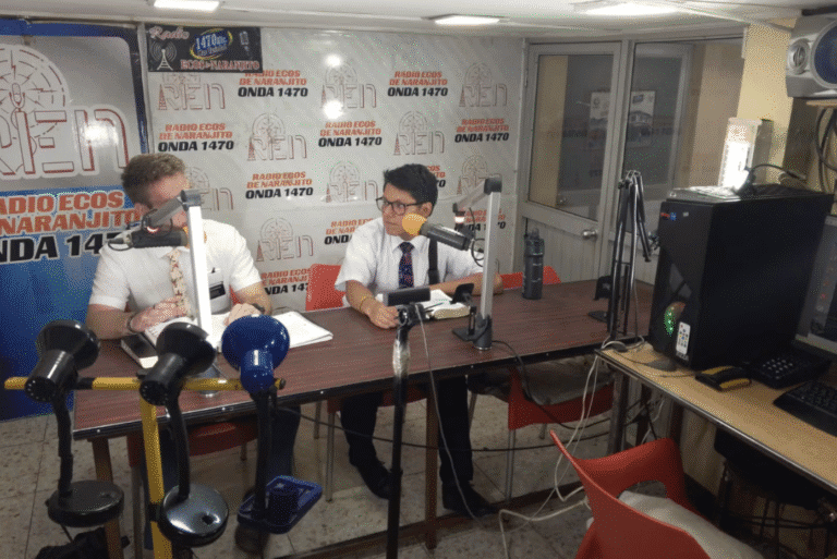 Latter-day Saint missionaries broadcasting a gospel message on Radio Ecos de Naranjito in Ecuador.