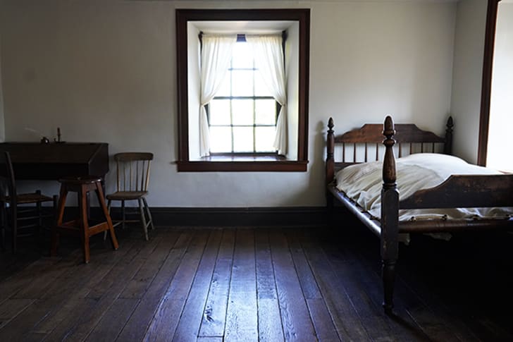 The restored bedroom inside Carthage Jail where Joseph Smith, Hyrum Smith, John Taylor, and Willard Richards were held prior to the martyrdom.