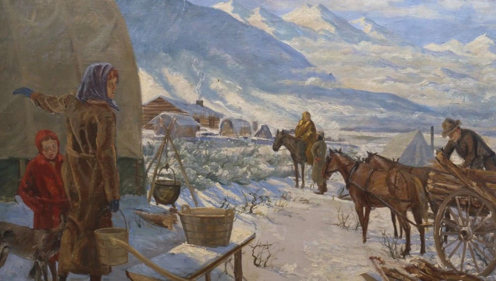 Latter-day Saint pioneers arriving in the Rocky Mountains during winter, unloading wagons and settling near snow-covered cabins and peaks.