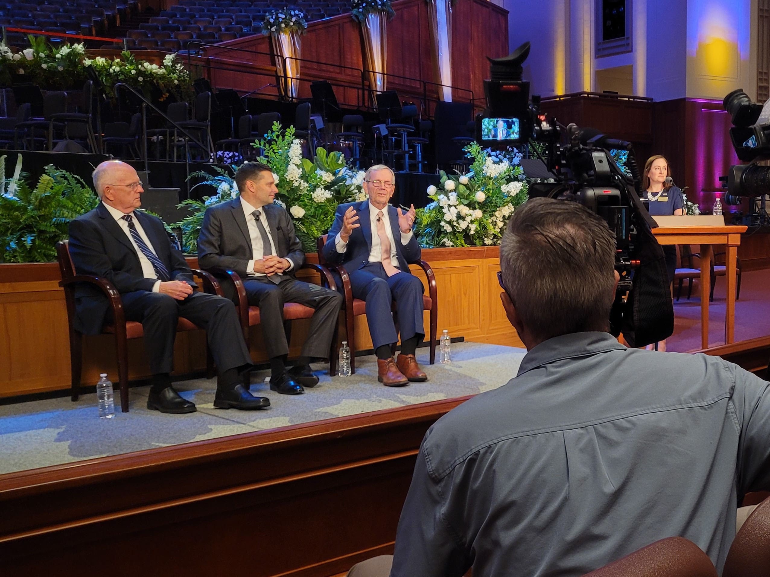 Michael O. Leavitt, Mack Wilberg, Derrick Porter, and a host discuss the legacy of Music and the Spoken Word during a live broadcast panel honoring the 5,000th performance.