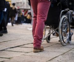 Wheelchair user symbolizing Shirley Robideau’s resilience, faith, and life story in Holding to the Iron Rod