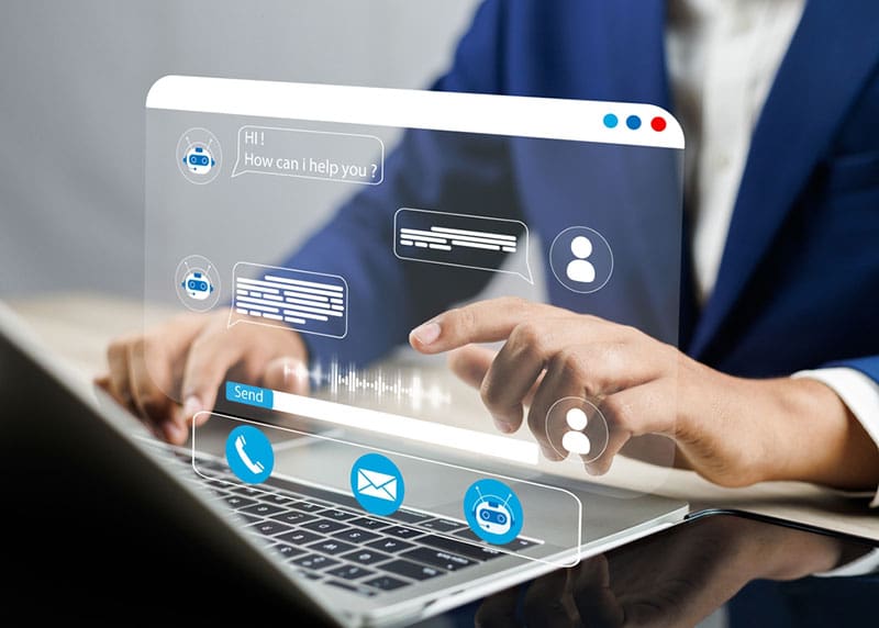 Man using chatbot technology on laptop symbolizing the rise of AI in spiritual life and the caution taught in The Church of the Chatbot article.