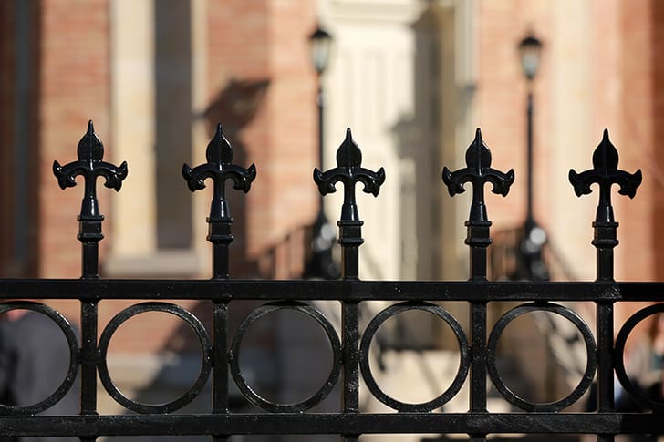 Black wrought-iron fence detail of the Provo City Center Temple, representing protection and sacred space in President Nelson’s temple teachings.