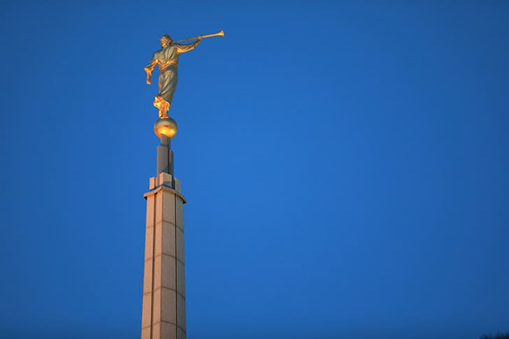  The Angel Moroni statue atop a temple spire, representing priesthood keys, restoration, and President Russell M. Nelson’s call to rejoice in temple blessings.