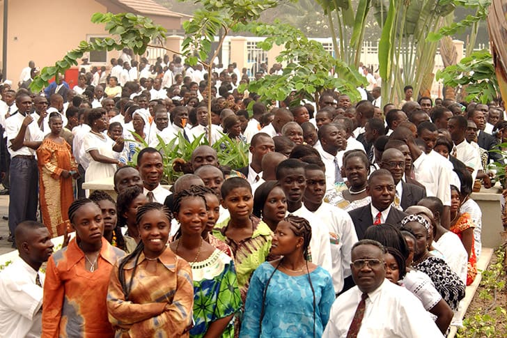A diverse gathering of Latter-day Saints in Africa, symbolizing President Russell M. Nelson’s call to gather Israel on both sides of the veil.