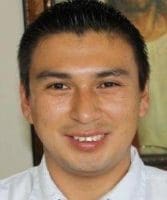 A portrait of Elder Saucedo, a missionary in the Dominican Republic, whose testimony was transformed after a miraculous encounter while sharing the Book of Mormon.