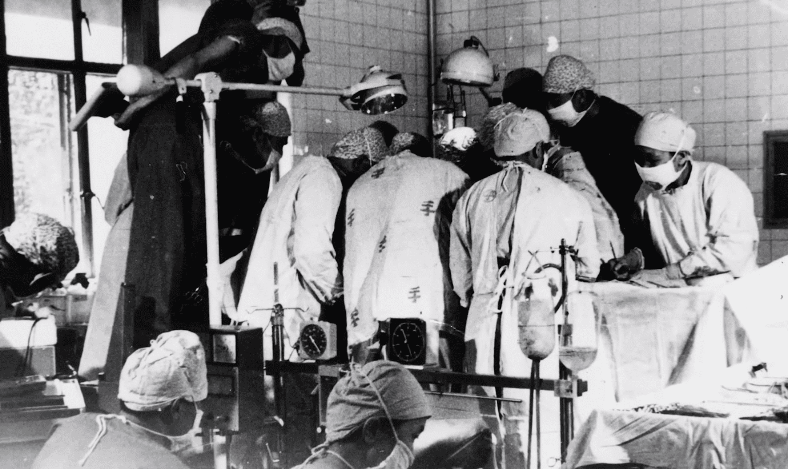 President Russell M. Nelson performing heart surgery in China, demonstrating his pioneering work as a world-renowned heart surgeon.