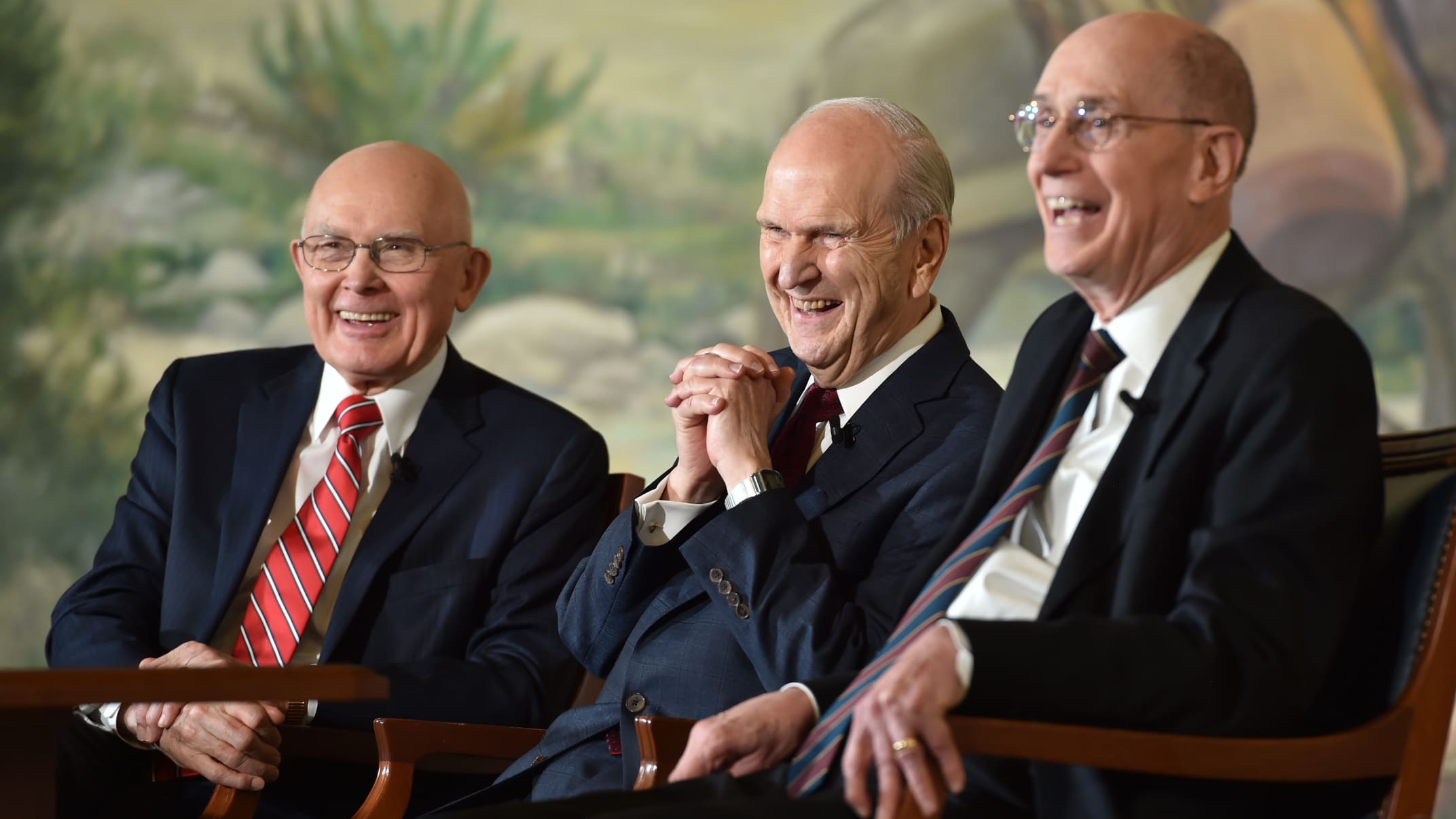President Russell M. Nelson sits with his counselors President Dallin H. Oaks and President Henry B. Eyring, leading The Church of Jesus Christ of Latter-day Saints.