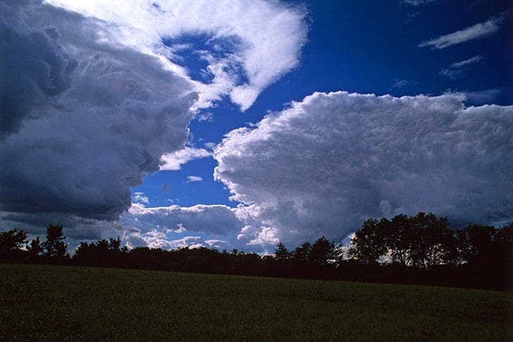 Storm clouds over Far West Missouri, where Saints endured trials and received revelations in D&C 115–120.