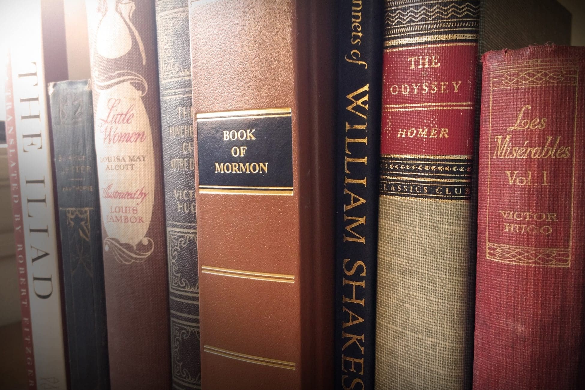 Book of Mormon displayed beside classic literature, highlighting its divine truth and significance among great books.