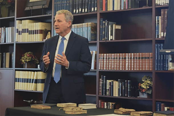 Elder LeGrand R. Curtis Jr. presenting historic records for the Wilford Woodruff Papers Project.