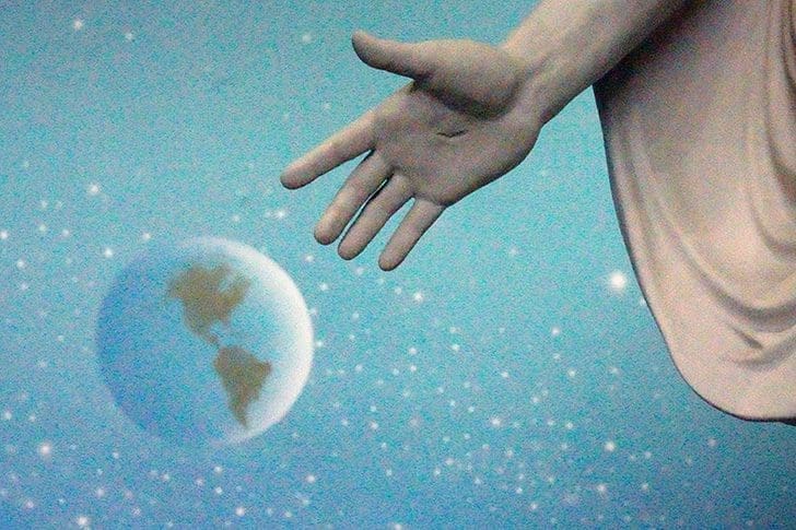 Christ’s hand reaching toward the Earth, symbolizing the call to Prepare to Meet Christ and the prophecies of His Second Coming in Doctrine and Covenants 133.