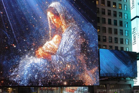 Illuminated image of Jesus Christ and child representing Christmas messages from apostles of The Church of Jesus Christ of Latter-day Saints.