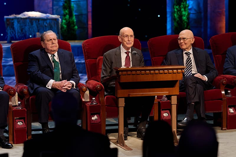President Eyring, President Holland, and President Oaks speak at the First Presidency Christmas Devotional, sharing messages of Christ’s love, hope, and healing.