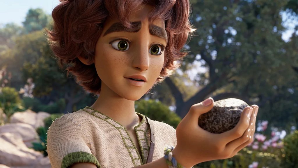 A close-up scene from David showing young David holding a stone, reflecting his faith, courage, and trust in God before facing overwhelming odds.