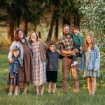 Family gathered outdoors representing the Family Proclamation and prophetic teachings on marriage, parenting, and the eternal importance of family