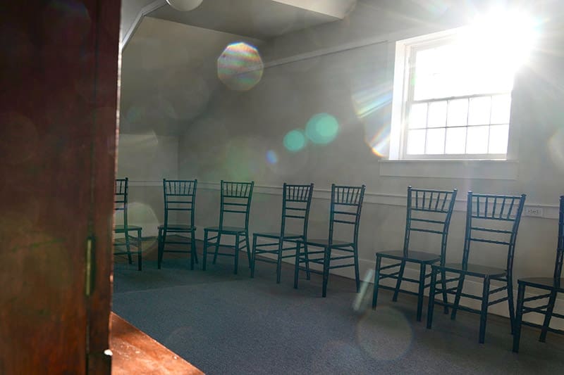 Sunlit upper room of the Kirtland Temple where early Saints experienced visions and spiritual manifestations.