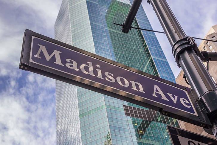 A Madison Avenue street sign in New York City, symbolizing Meridian Magazine’s early struggle to gain advertiser support and the ongoing need for voluntary subscriptions to sustain faithful Latter-day Saint media.