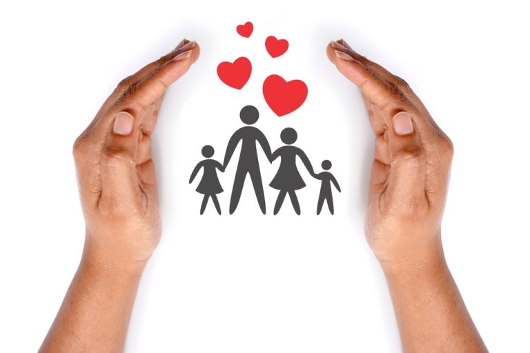 Hands protecting a family symbol, representing the traditional family, child well-being, and concerns about polyamory and alternative family structures.