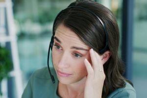 Woman listening intently during a difficult conversation about faith and relationships when a loved one leaves the Church.