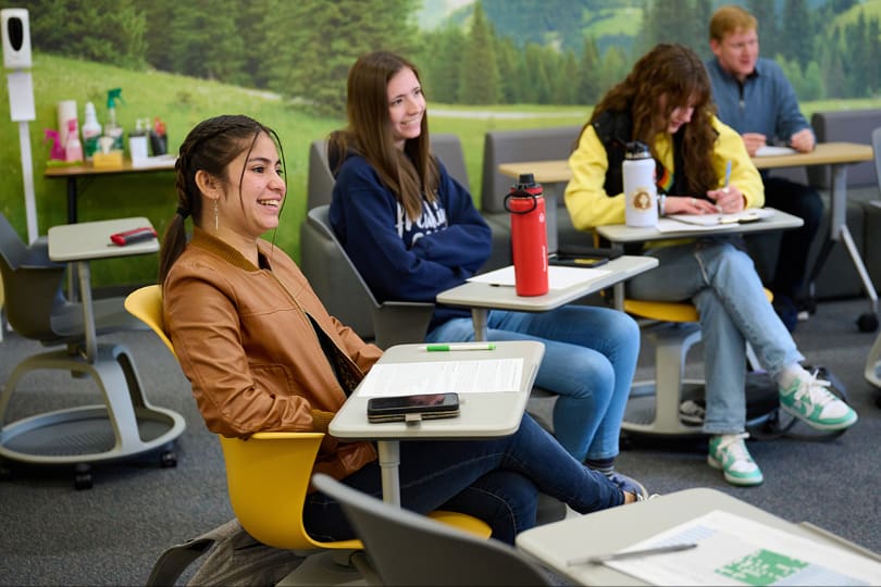 Young adults attending an Institute of Religion class focused on Jesus Christ, faith, and discipleship during Institute’s 100th anniversary.