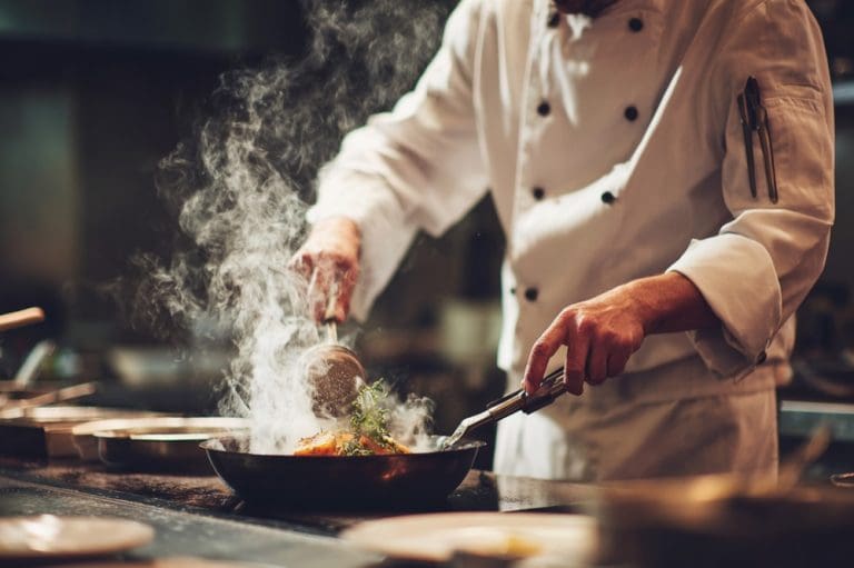 Chef preparing gourmet dish as a metaphor for slowing down in scripture study to feel the Scriptures and receive personal revelation.