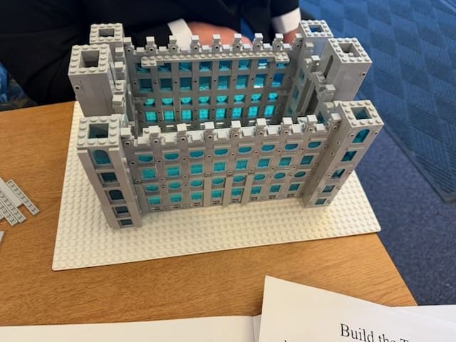 A partially completed Lego-style Salt Lake Temple build representing a Ward Family’s collective effort to center life and worship on the Temple.