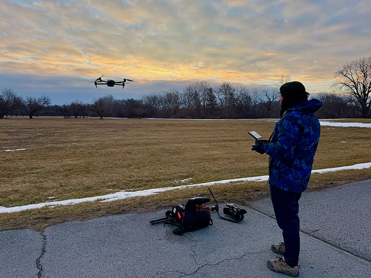 A drone is launched during a winter shoot to capture aerial views of historic Church landscapes tied to Joseph Smith’s life.