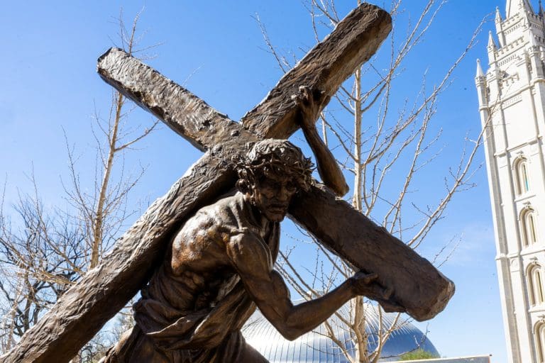 Jesus Christ statues Temple Square Salt Lake Temple Easter season carrying cross Gethsemane Calvary