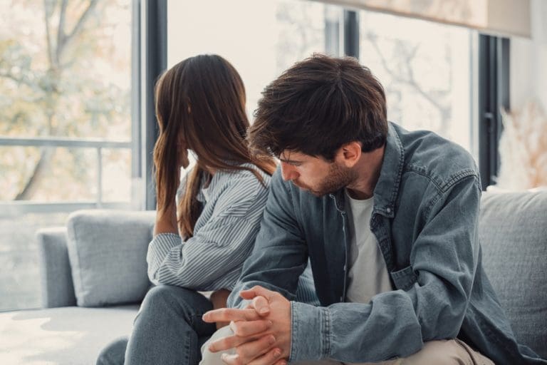 Couple struggling with betrayal in marriage illustrating pornography betrayal and the journey toward healing from betrayal.