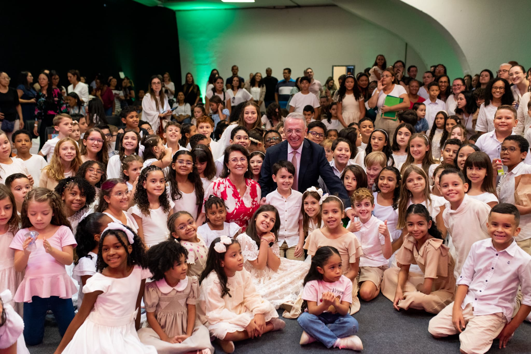 Children and families gather with Elder Ulisses Soares during a community event connected to the Tabernacle Choir’s “Songs of Hope” tour in São Paulo, Brazil.
