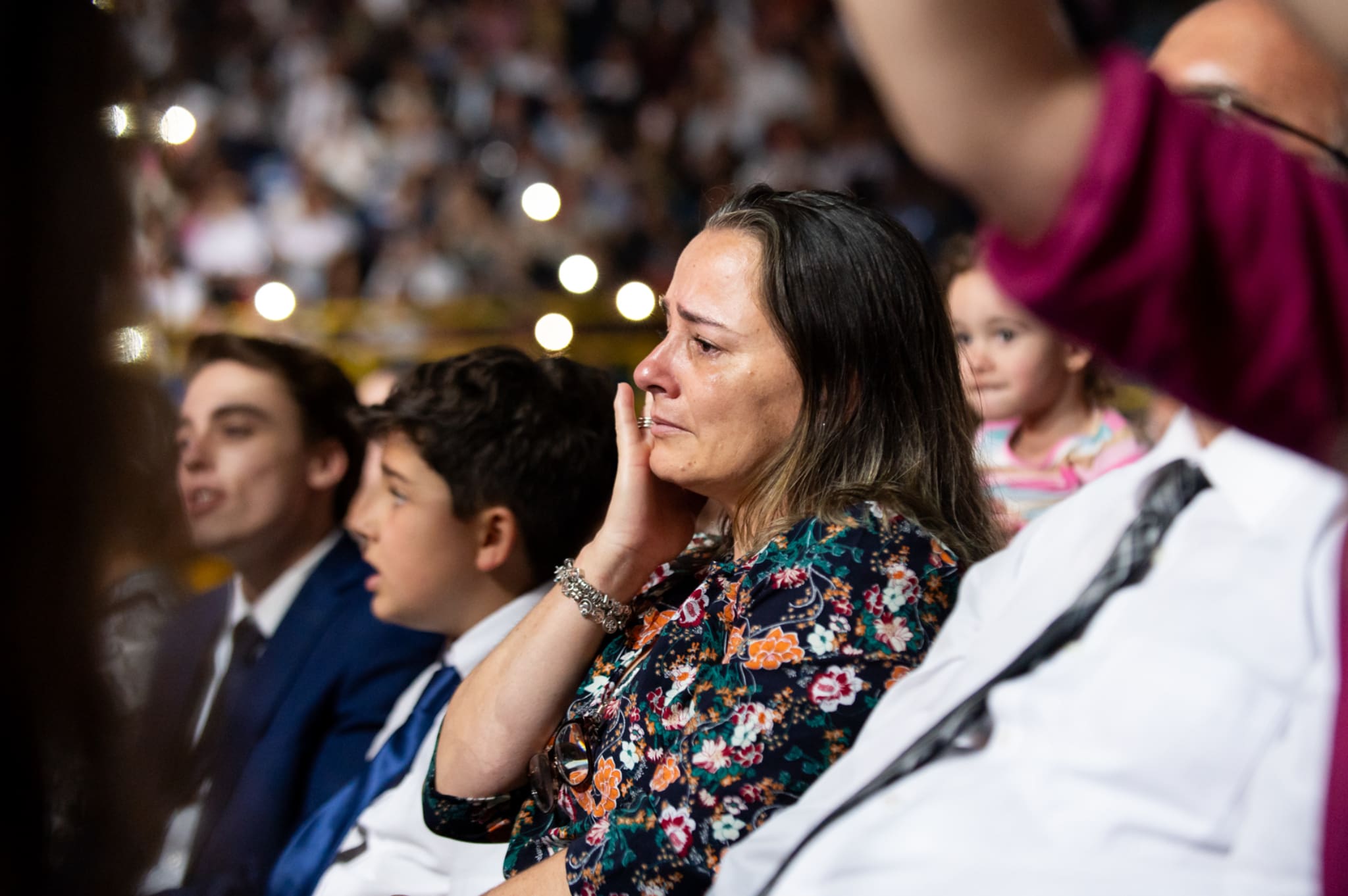 A woman in the audience reacts emotionally as the Tabernacle Choir performs sacred music during the “Songs of Hope” concert in São Paulo, Brazil.