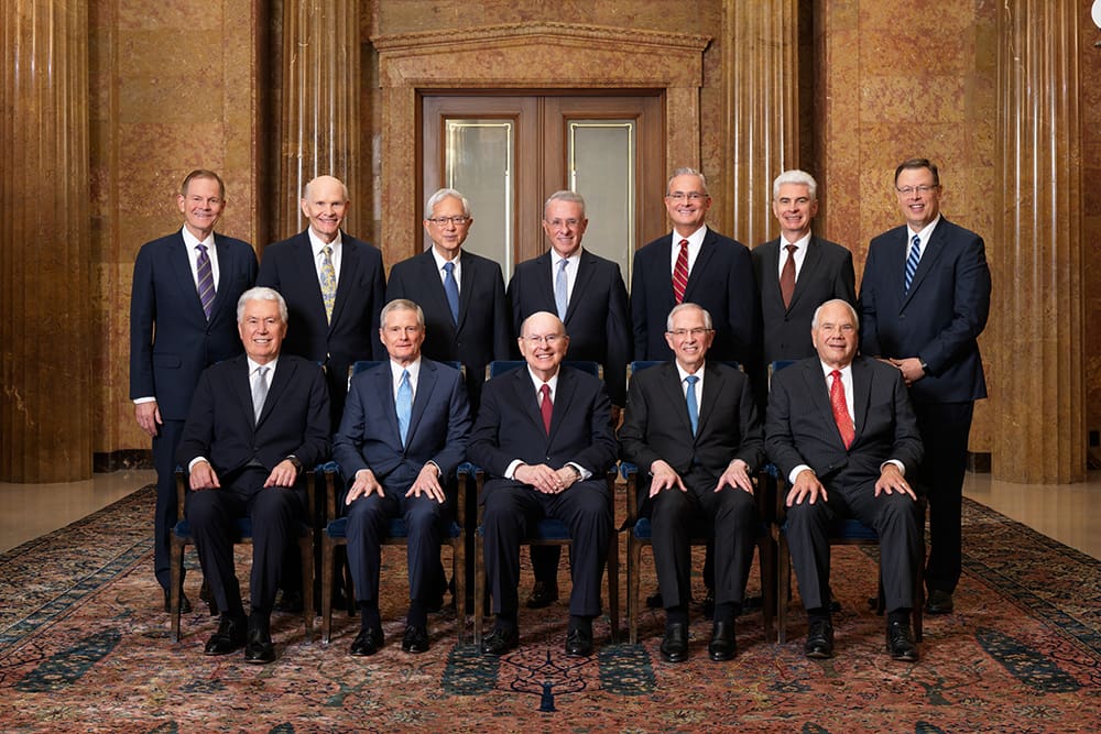 Official portrait of the First Presidency and the Quorum of the Twelve Apostles of The Church of Jesus Christ of Latter-day Saints, photographed in the Church Administration Building on March 4, 2026, including newly called Apostle Elder Clark G. Gilbert following the passing of President Jeffrey R. Holland.