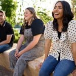 Youth and young adults gathered together representing Seminary and Institute enrollment growth and Institute classes worldwide.