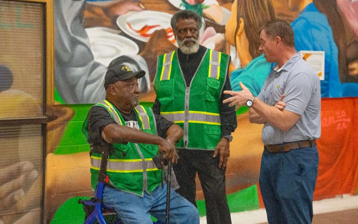 Close-up of food preparation symbolizing humanitarian aid and food donations highlighted in this global Church Report.