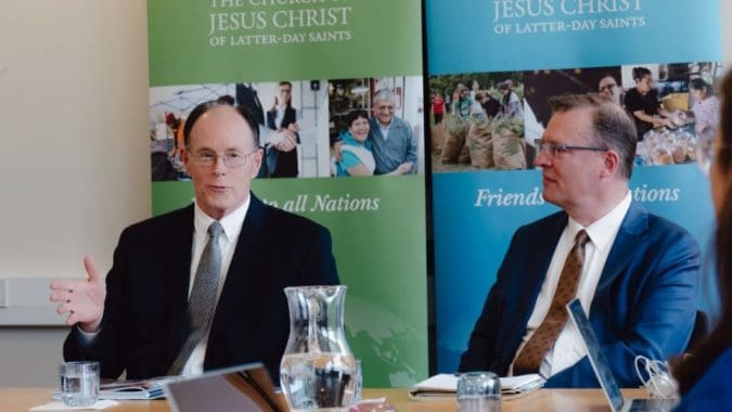 Church leaders meeting with humanitarian organizations in London to discuss collaboration and global relief efforts.