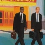 Latter-day Saint missionaries walking past Broadway Book of Mormon musical sign illustrating anti-Mormonism and religious stereotypes
