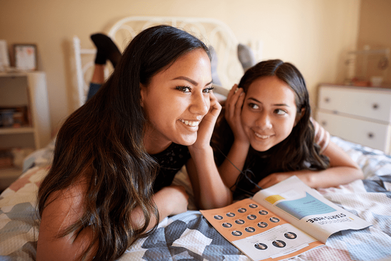 children using General Conference activities for children including notebook bingo and coloring pages during LDS General Conference