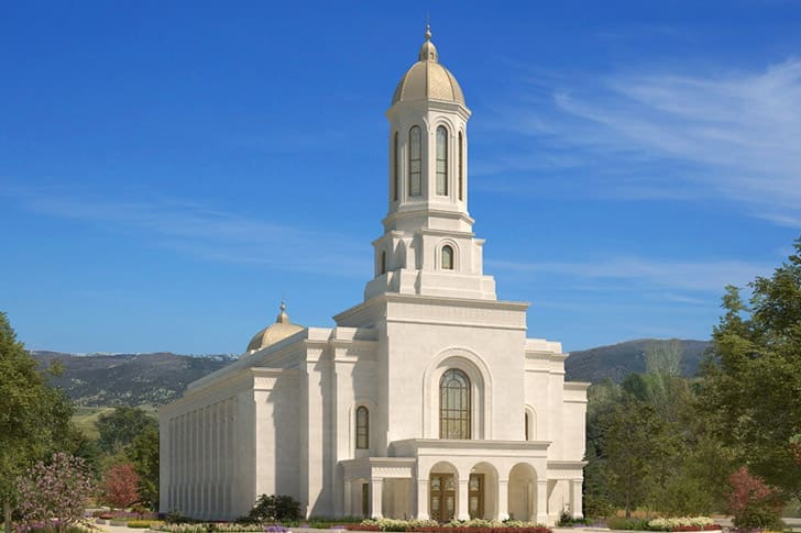 Exterior of a newly constructed temple surrounded by natural landscape, symbolizing temple announcements and expansion.