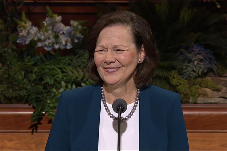 President Susan H. Porter speaking at General Conference 2026, emphasizing the worth and dignity of God’s children in a global Church Report.